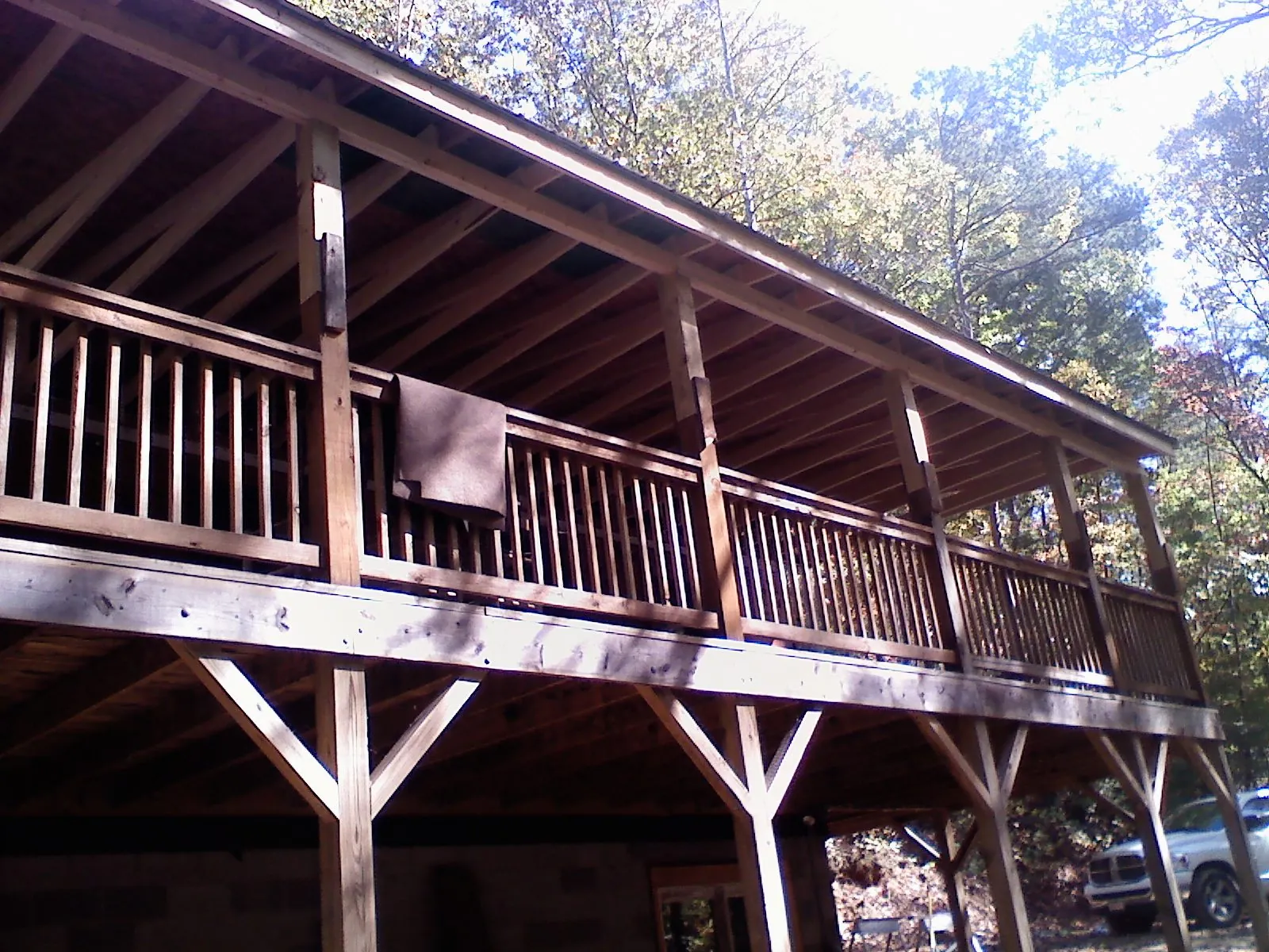 Timber framing under a new elevated porch and deck — Roof Leak Repair in West Hartland by Roofing Brothers
